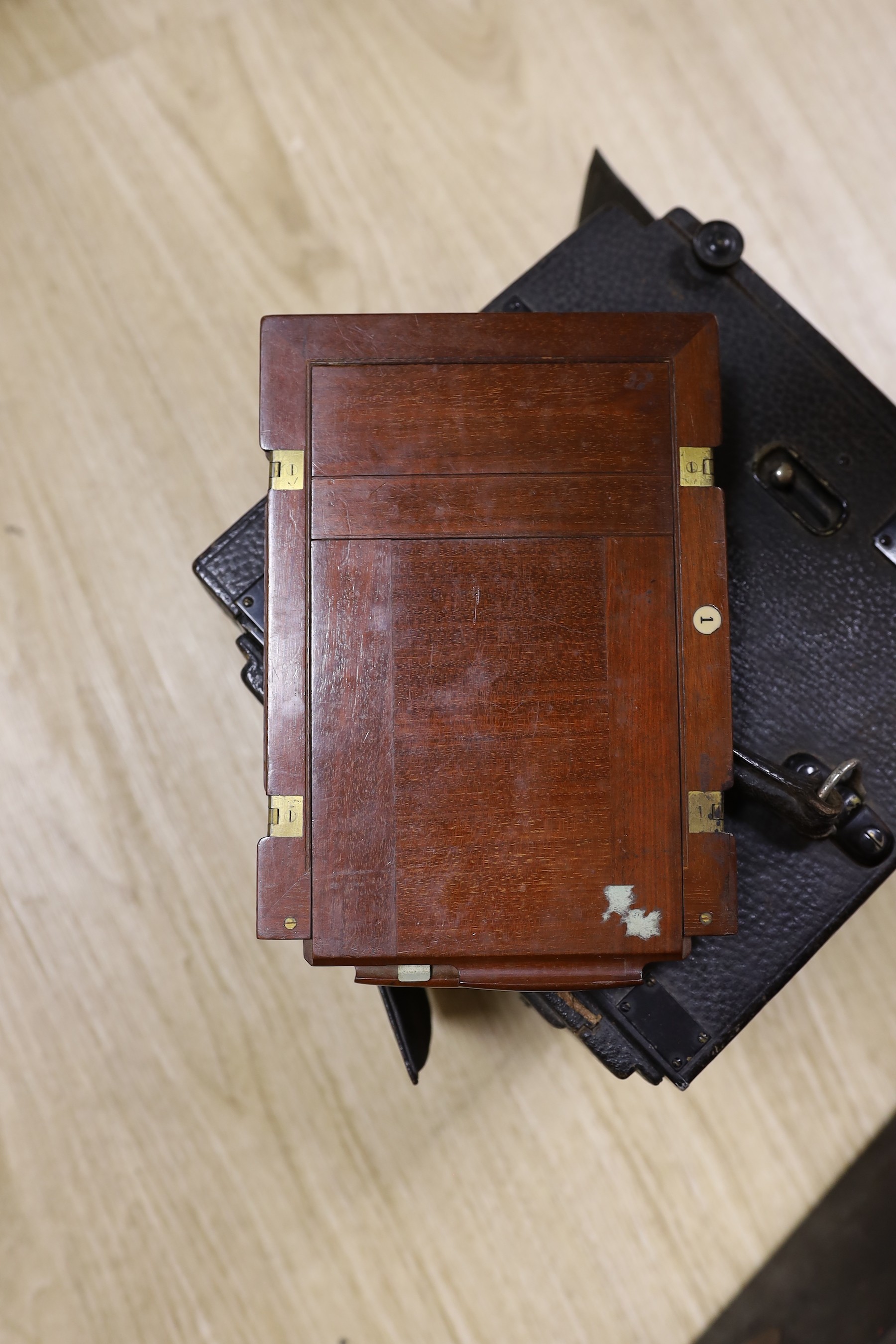 An early 20th century Royal Engineer's cased plate camera and plates